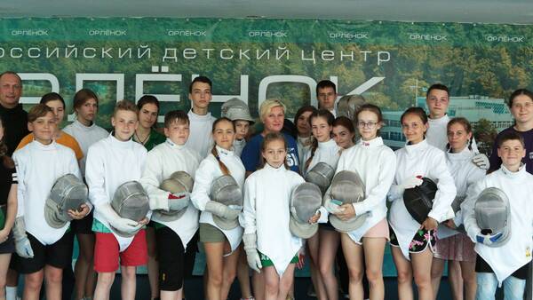 чемпионкой мира по фехтованию на саблях ИРИНОЙ БАЖЕНОВОЙ..